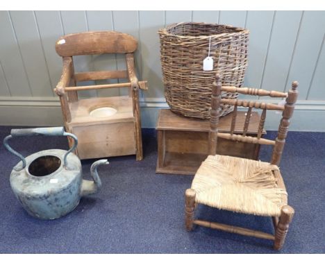 A 19th CENTURY CHILD'S CHAIRwith commode seat, a child's turned chair, a basket, and other items