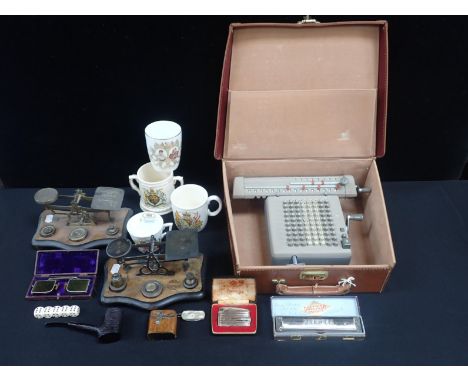 TWO SETS OF POSTAL SCALESa Monroe calculating machine, an antique case pair of protective spectacles, a harmonica, travel ink