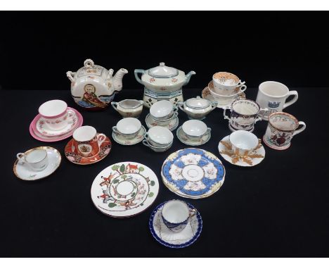 A DRESDEN RAISED GILDING CUP AND SAUCERwith other ceramics including Royal commemoratives, a Japanese service etc