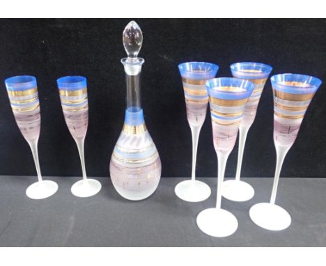 A SET OF ART GLASS FLUTES  AND MATCHING DECANTERpainted, satinised and gilt, comprising four taller flared flutes and two oth