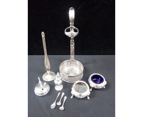 A SILVER PLATED BOTTLE HOLDER with a Silver mustard pot, Silver pepper shaker, three Silver salt spoons, a pair of Silver pla