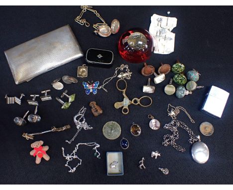A SILVER CIGARETTE CASE, AND OTHER ITEMSincluding a sovereign case, locket, silver cufflinks a papier-mache snuff box etc