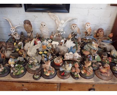 A COUNTRY ARTISTS RESIN FIGURE - 'MOUNTAIN SENTINAL'model CA822 and a large collection of Country Artists bird and animal fig