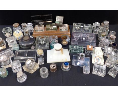 A SILVER-MOUNTED ONYX INKWELL, AND OTHER INKWELLStwo other silver-mounted, one faience, porcelain, many glass, and related it