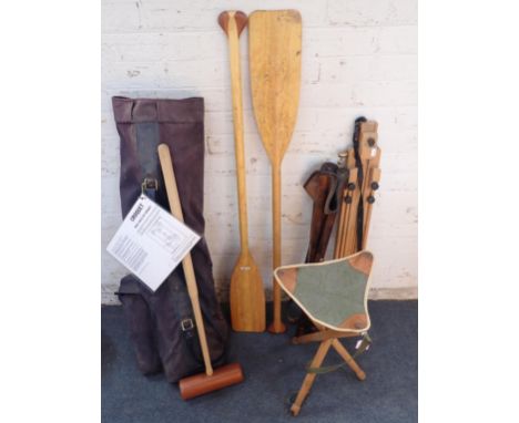 A CROQUET SET, IN CANVAS CARRIERan artist's easel, two folding stools, and a pair of 1.2m paddles