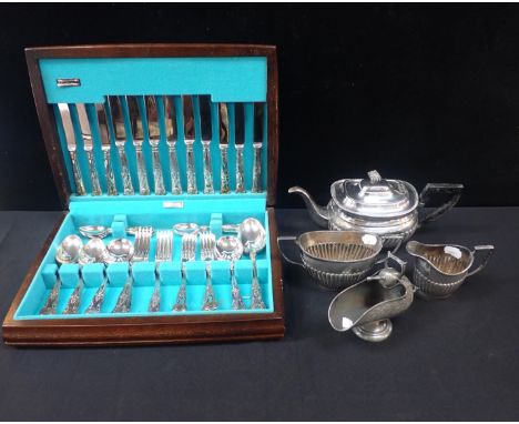 A SILVER-PLATED THREE PIECE TEA SERVICEa plated King's pattern canteen and, a 'scuttle' sugar basin