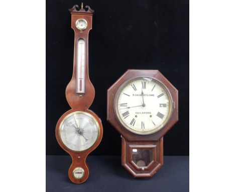 A MAHOGANY WHEEL BAROMETERby Rodgerson, St James' St, Liverpool (tube damaged) and an American drop-dial clock, retailed R. S