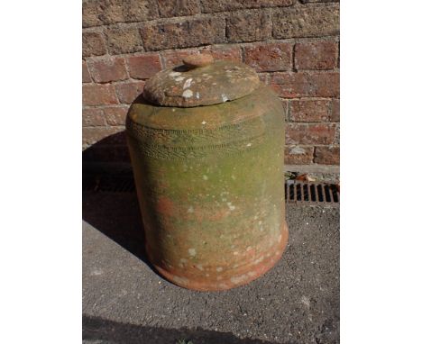 A TERRACOTTA RHUBARB OR KALE FORCER, WITH ORIGINAL LIDand impressed rouletted decoration 46cm high (chips to lid rim, a few s