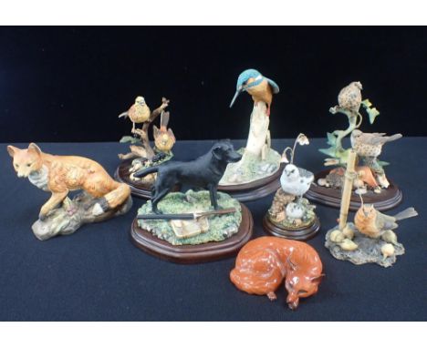 A BESWICK FOXwith seven other ceramic figures of wild life; three border Fine Art figures (8)