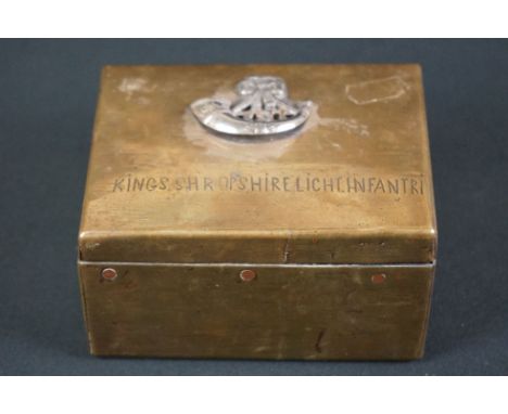 A hand made brass box with hinged lid badged to the Shropshire Light Infantry. 