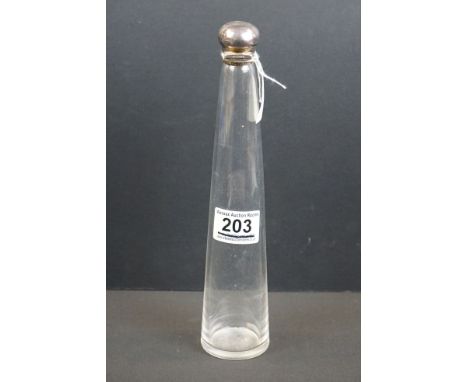 A fully hallmarked sterling silver topped glass hunting flask. 