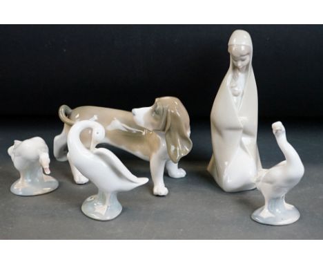 Five Lladro porcelain figures to include Bassett Hound, 20cm long, veiled mother carrying baby, and 3 x geese, printed marks 