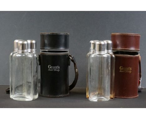 Two Grant's Scotch Whisky travel spirit flask sets, each containing three fitted glass flasks with tot caps, contained within