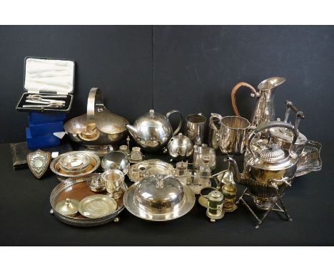 Collection of mixed silver plate and pewter ware to include silver plated cruet sets, kettle on a branch-design stand, trophy