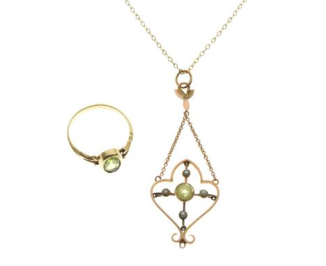 9ct gold ring set single faceted peridot, size K,  and an unmarked pendant set periot and seed pearls, on a chain stamped '9c