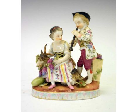 Sitzendorf porcelain figure group, after 18th Century Meissen, modelled with a girl seated on a goat and holding a vine with 