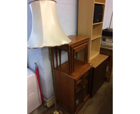 A nest of tables, a lamp, a bookcase and cabinet etc.