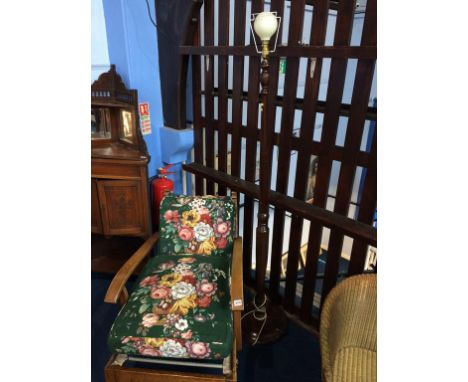 An armchair and standard lamp