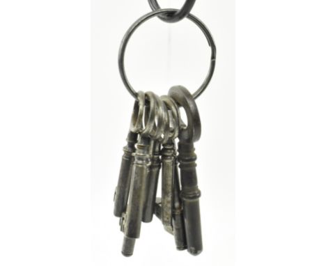 A bunch of seven mid 19th century Victorian prison keys. The lot to include a master key by Charles Smith Sons &amp; Co. Birm