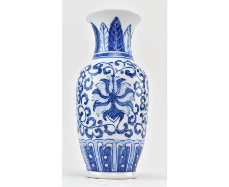 A small Chinese vintage 20th century blue and white ceramic vase. The baluster vase has a flared mouth rim, bands of lappets 