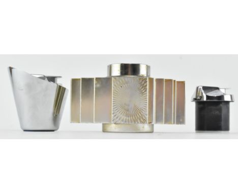 Two mid century cigarette lighter inserts. The lot to include a 1960s Japanese Brutalist table lighter, Sarome Piezo Electric