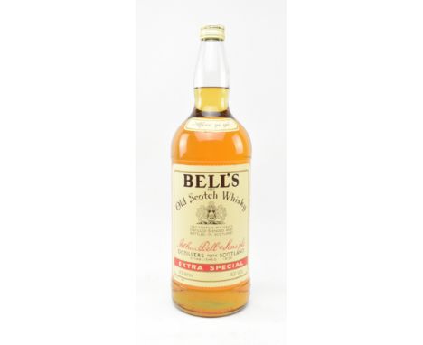 A vintage believed 1970s bottle of 4.5 litre Rehoboam size Bell's old Scotch whisky Extra Special, 40% vol, intact.&nbsp;