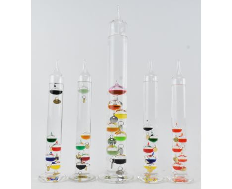 A collection of five vintage mid century Galileo glass thermometers. Each standing thermometer with multicoloured liquid. Tal