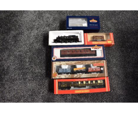 A Bachmann 00 gauge 2-6-2 LMS Ivatt Tank Engine 1202, boxed 31-453A with four similar 00 gauge boxed Rolling Stock items