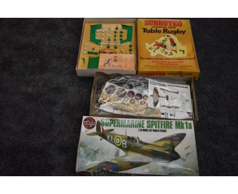 A Airfix 1:24 scale plastic kit, Supermarine Spitfire MK 1a, appears unmade, in original box along with a Subbuteo Table Rugb