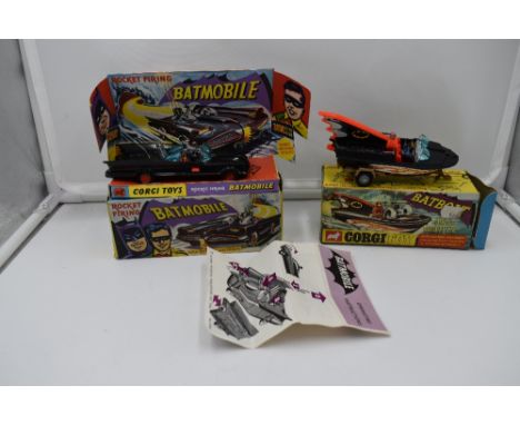 Two Corgi diecasts, Bat Mobile, with Batman and Robin figures present, on card display stand with Instruction Leaflet and Bat