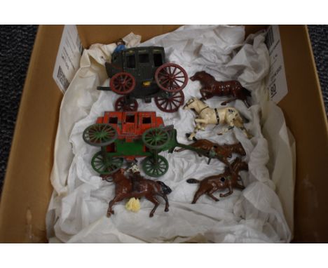 A JoHillCo and a Cresent Lead Stage Coach with Two Horses along with a Britains Lead Cowboy on Horseback