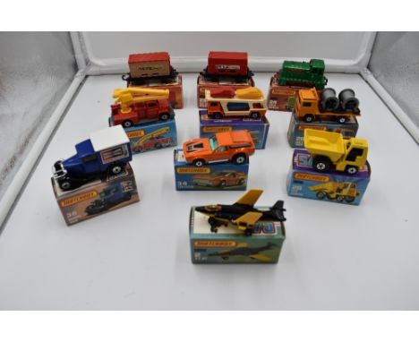 A collection of twenty one Matchbox 75 Series diecasts, S2 Jet 2, Car Transporter 11, Snorkel Fire Engine 13, Diesel Shunter 