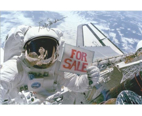 Dale Gardner NASA Astronaut STS8, 51a signed 10 x 8 colour EVA photo. STS-8 launched from the Kennedy Space Center, Florida o
