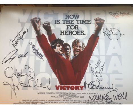 ESCAPE TO VICTORY 16x12 inch photo signed by NINE footballing legends who starred in the classic film ESCAPE TO VICTORY. This