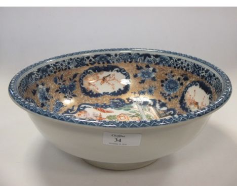 A Chinese famille rose basin, Qianlong, painted with figures within reserves, cracked, 26cm diam  