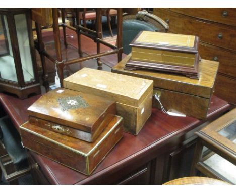 A Victorian walnut work box; a brass edged wooden box with key; another box with hinger cover and a tea caddy and a modern ci