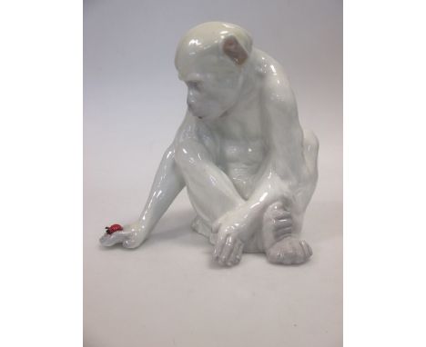 A Heubach Gebruder porcelain model of a monkey with a ladybird (R)  