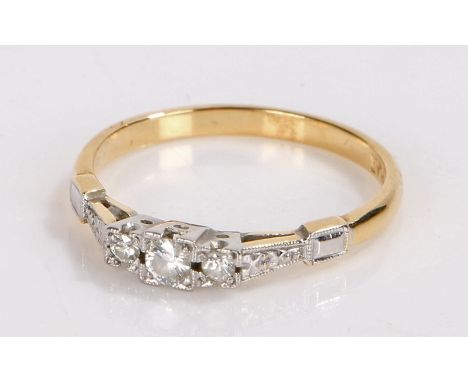 18 carat gold ring set with three diamonds, ring size P, 2.4g