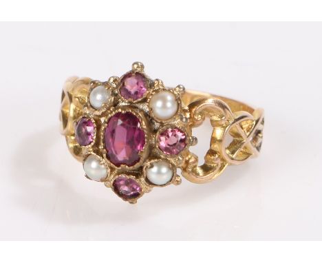 12 carat gold amethyst and pearl ring, the central oval amethyst surrounded by a band of pearls and amethysts, Birmingham mar