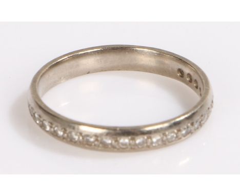 Unmarked white metal diamond set half eternity ring, ring size P 1/2, 3.1g