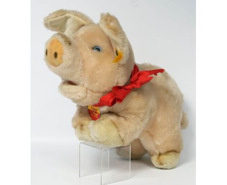 Schwein, Steiff. Hellrosa Stoff, li. Ohr mit Knopf und Fahne, l. bespielt. 20./21. Jh. D. 19x 36 cm. 