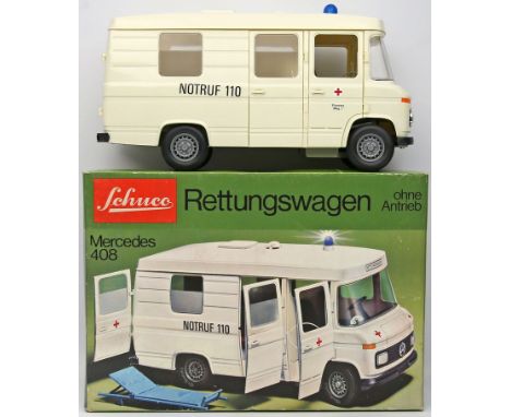 Modellauto Rettungswagen Mercedes Benz 408, Schuco, 1:16. In Originalverpackung mit Bedienungsanleitung. Kl. Riss in einem Fe