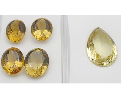 5 Citrine, zus. 255 ct. 1x tropfenförmig, 4x oval facettiert in aufwendigen Laserschliffen. Unterschiedliche Farbnuancen.