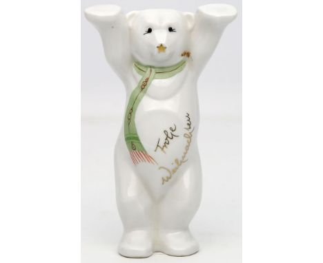 Buddy-Bär, KPM Berlin. Porzellan. Weiß mit buntem Schal und Aufschrift "Frohe Weihnachten". Szeptermarke über KPM, Berlin, ab