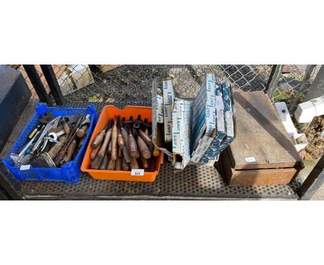 Collection of hand tools including vintage chisels