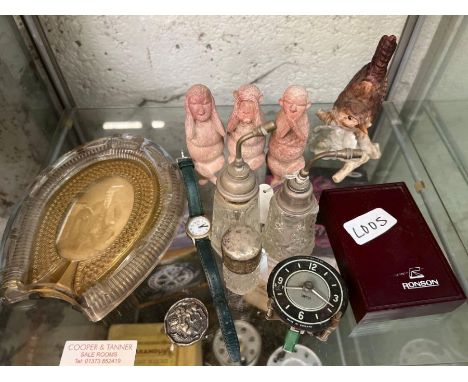 Collectables to include a glass picture frame, white metal button, lighter and other items