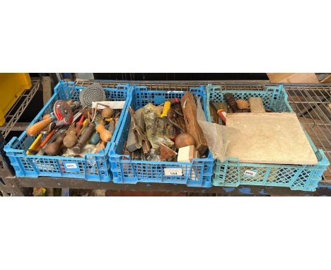 Three punnets containing assorted hand tools
