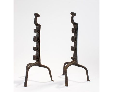 Pair of iron spit dogs, probably 17th Century, finial top above hooked backs, raised on curved supports, 44cm high, (2)