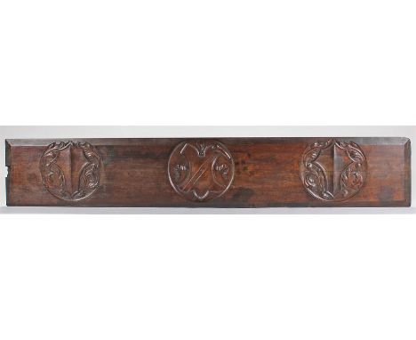 19th Century mahogany carved panel, carved with three shields, 188cm x 32cm