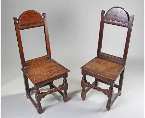 Pair of late 17th Century oak chair back stools South Lancashire/North Cheshire. The square section back with a high arched s
